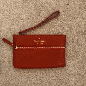 Orange Kate Spade Wristlet